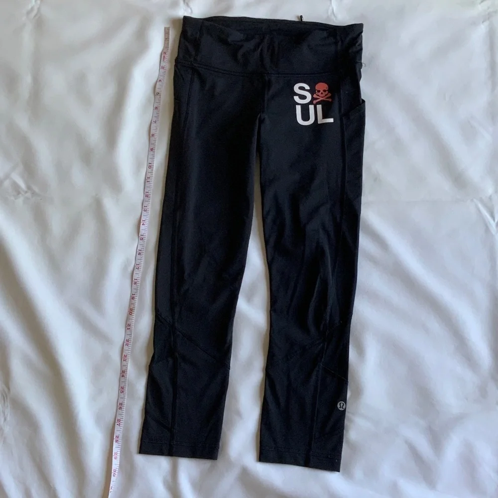 Lululemon Athletica Soul cicle capri Black Leggings with Red Skull Design
